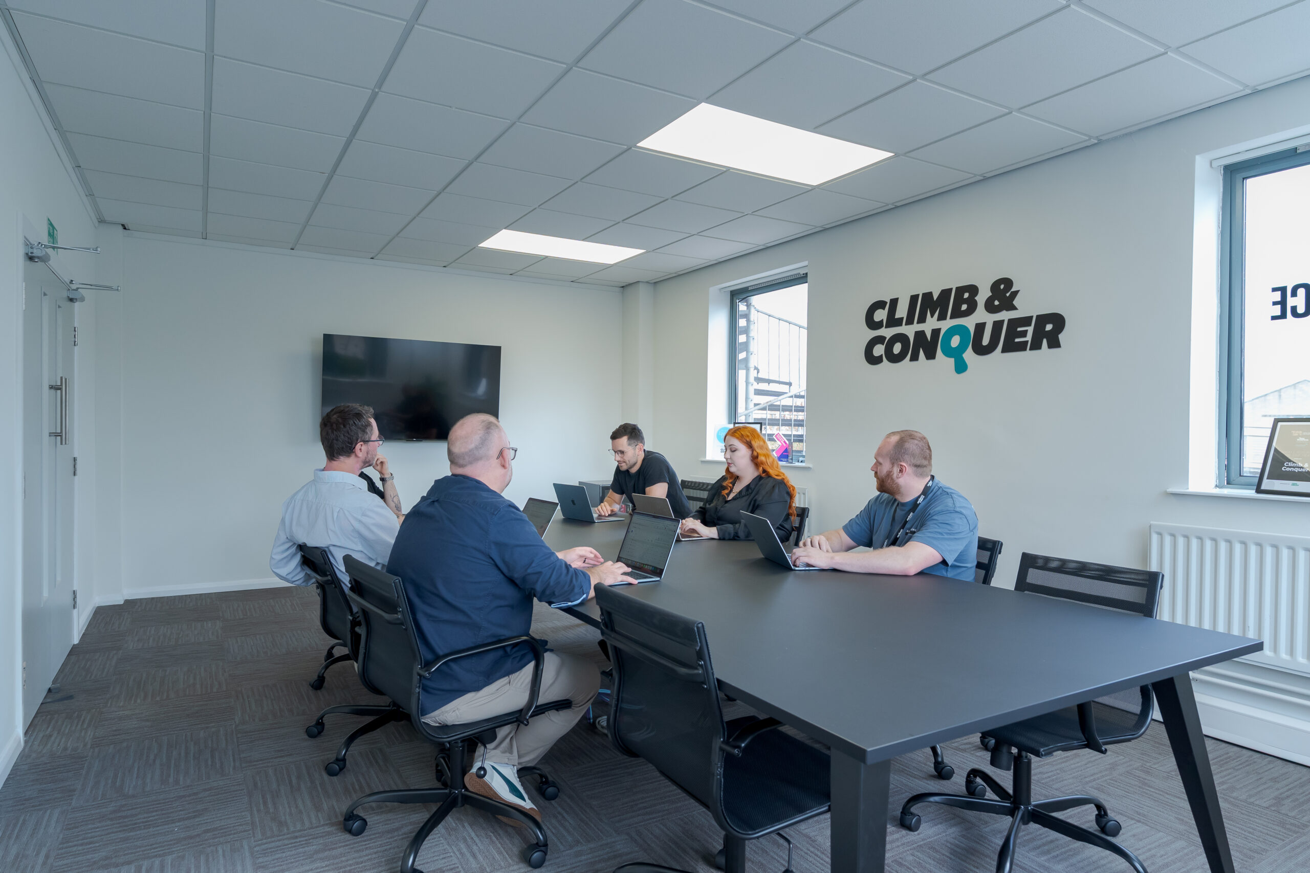 Climb & Conquer Board Room Meeting