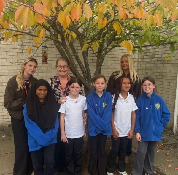 Daisy and Kelsey from Climb & Conquer with pupils at the Power of Women Primary Ambassador interviews at Tilery Primary School